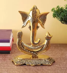 Metal made trunk ganesh statue without stomach on stand